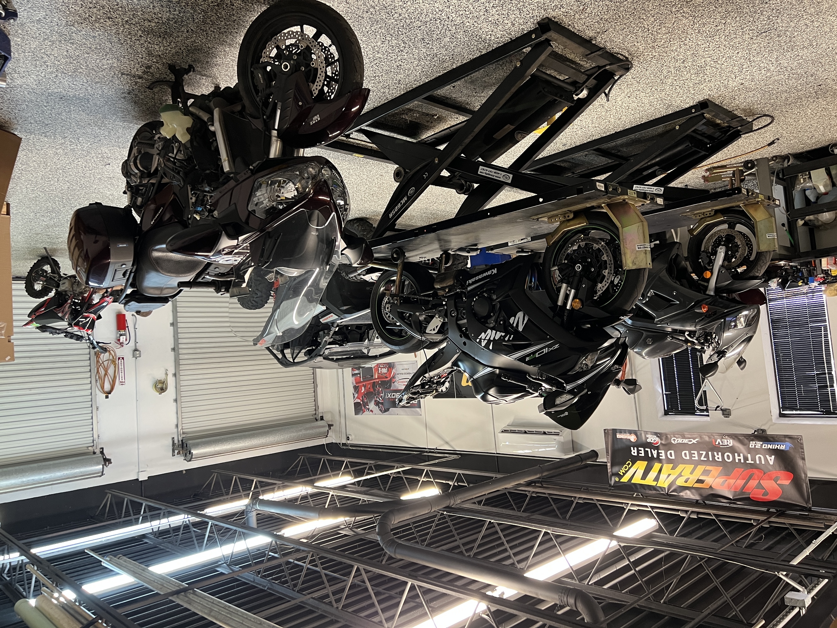 Powersports vehicles parked in the S&N service department shop